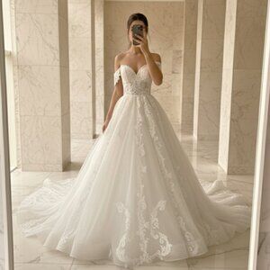 Luxury Off-Shoulder Princess Wedding Gown – Royal Volume & Cathedral Train